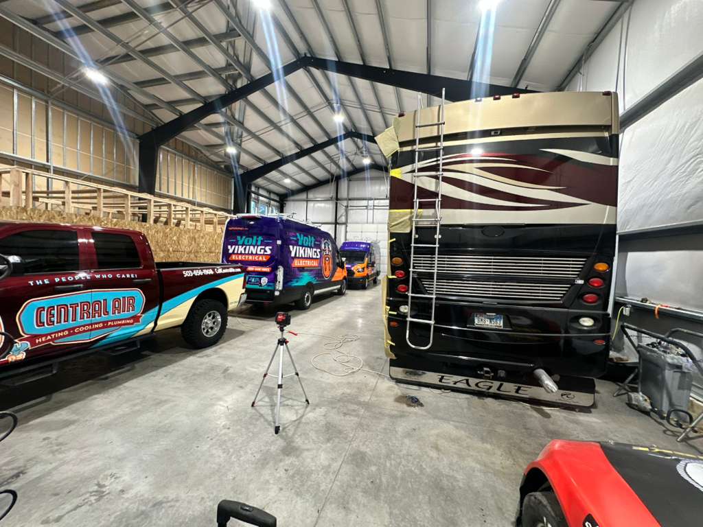 Service truck with a partial wrap promoting a local business